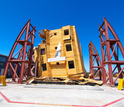 Photo of wood structure after testing on a shake table